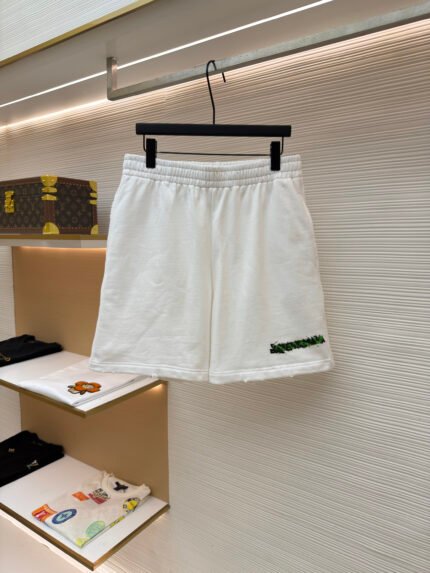 Balenciaga Tape-Distressed Trim Angled-Pocket Shorts