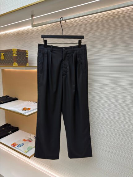 The Row wool double-pleated straight-leg trousers