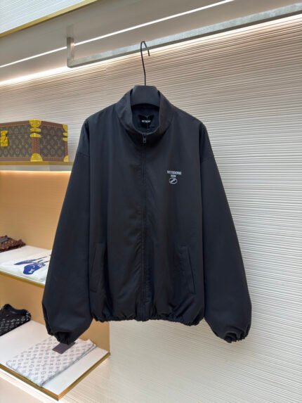 WE11DONE Distressed Logo Stand-Collar Jacket