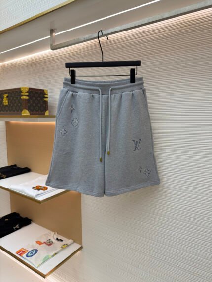 LOUIS VUITTON Monogram-embroidered drawstring shorts